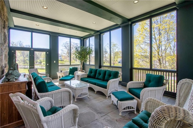 sunroom / solarium with beamed ceiling