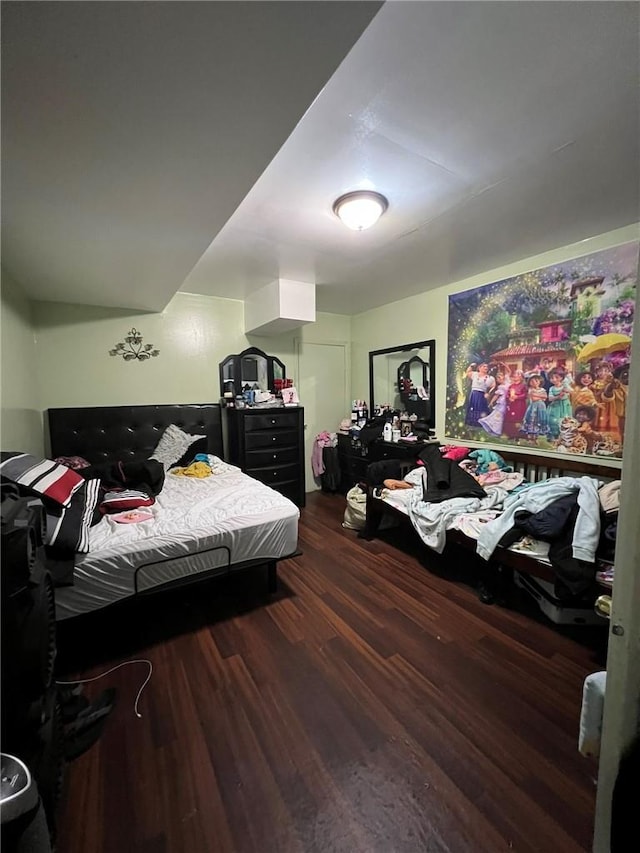 bedroom featuring dark hardwood / wood-style floors