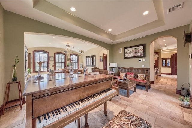 misc room featuring a tray ceiling