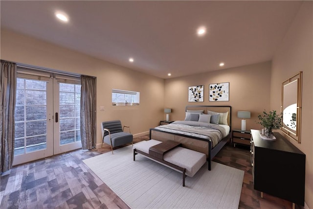 bedroom with access to outside, multiple windows, and french doors