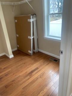 washroom featuring wood-type flooring