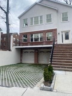 view of front of home featuring a garage