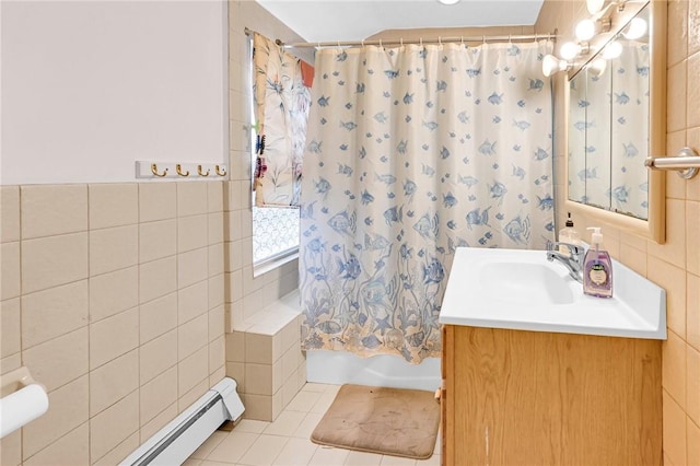 bathroom featuring a baseboard radiator, tile patterned floors, shower / bath combination with curtain, vanity, and tile walls