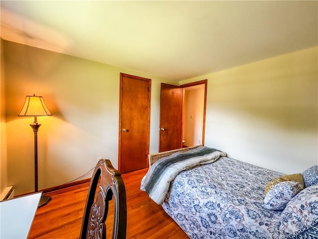 bedroom featuring dark hardwood / wood-style floors