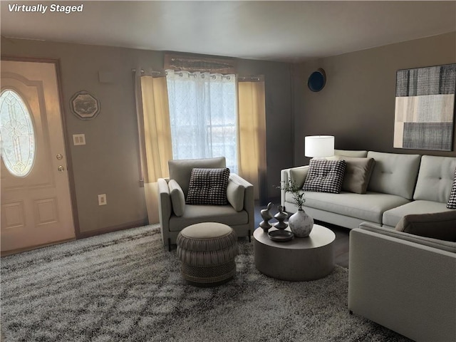 living room with carpet floors and a wealth of natural light