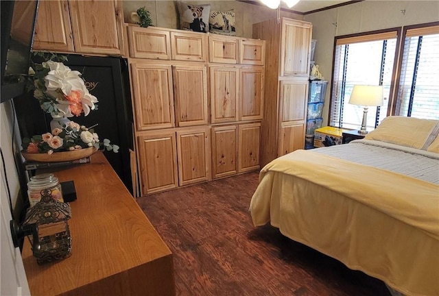 bedroom featuring dark wood-style flooring