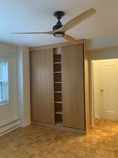 closet with a baseboard radiator