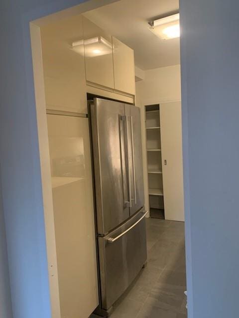 kitchen featuring high end refrigerator