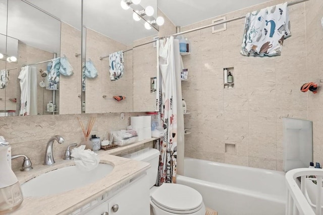 full bathroom featuring vanity, backsplash, toilet, tile walls, and shower / tub combo with curtain