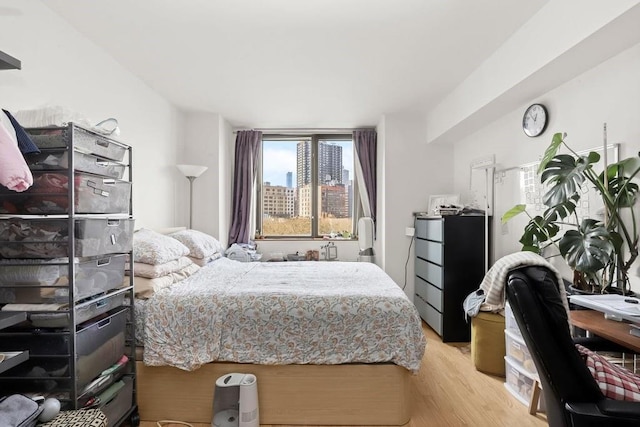 bedroom featuring light wood-type flooring