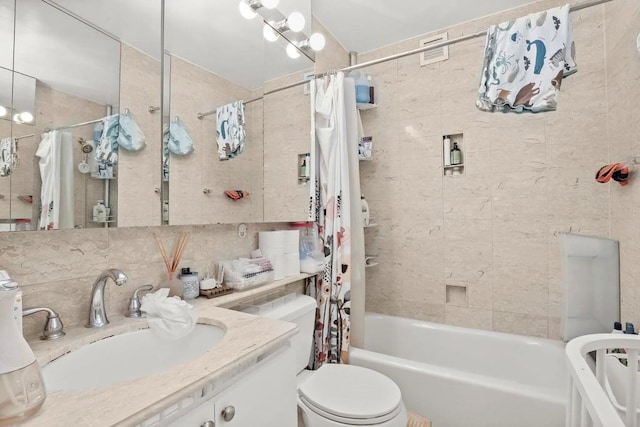 full bathroom with shower / bath combo with shower curtain, toilet, tasteful backsplash, and vanity