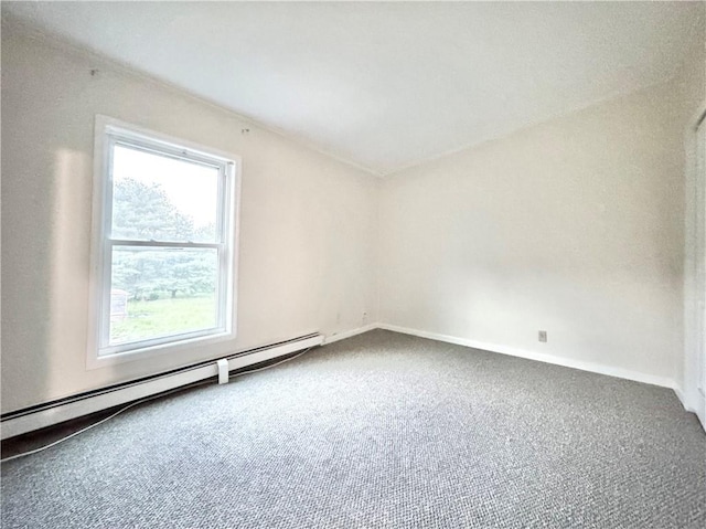 carpeted empty room with a baseboard radiator