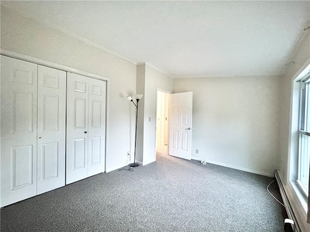 unfurnished bedroom with carpet and a closet