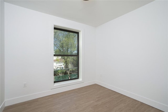 empty room featuring hardwood / wood-style floors