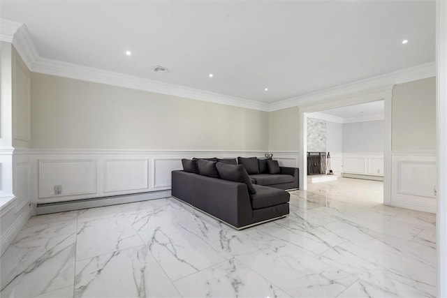 living room featuring a baseboard radiator and ornamental molding