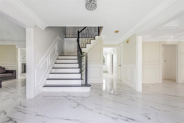 stairway with crown molding