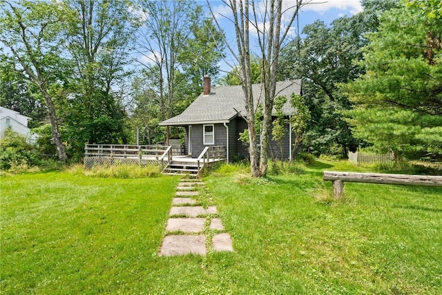 view of yard with a deck