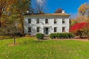 colonial house with a front yard