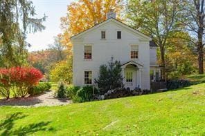 view of front of house with a front lawn