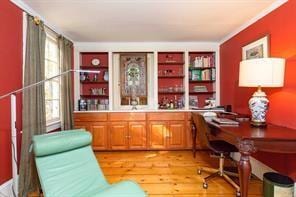 bar featuring light hardwood / wood-style flooring