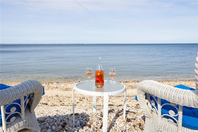 view of water feature with a beach view