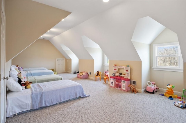 bedroom with carpet floors and vaulted ceiling