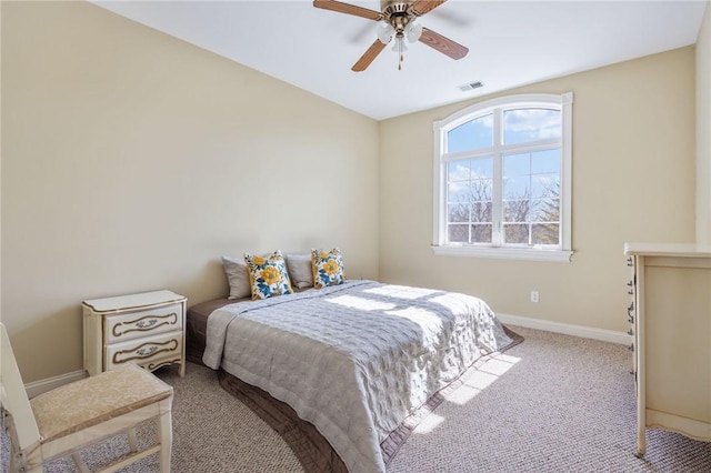 bedroom featuring ceiling fan and carpet