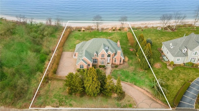 bird's eye view with a water view and a view of the beach