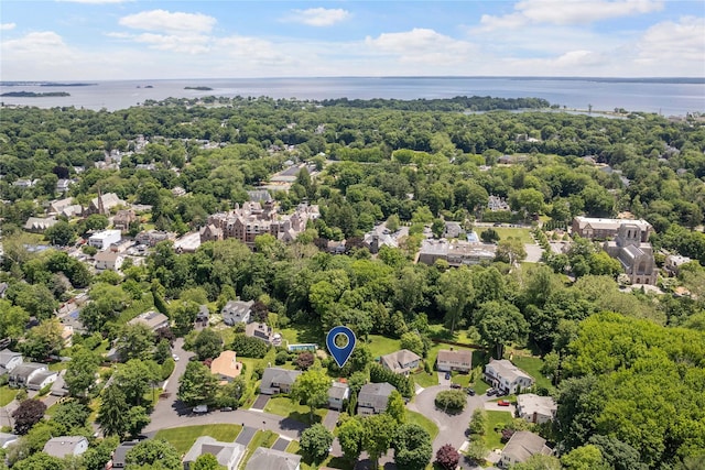 bird's eye view with a water view and a residential view