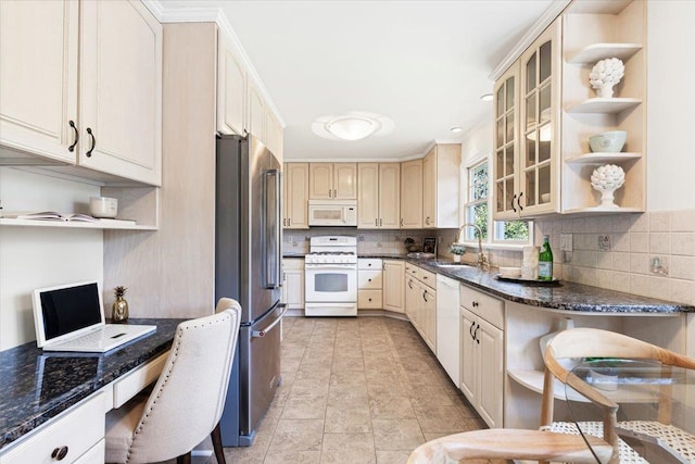 kitchen featuring tasteful backsplash, white appliances, a sink, and open shelves