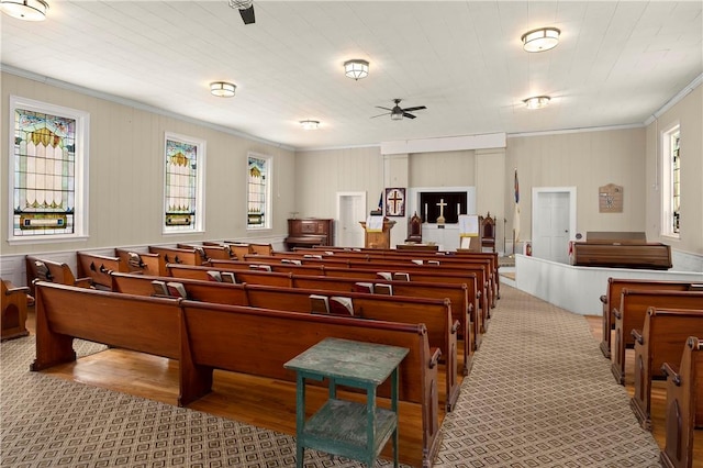 miscellaneous room with ceiling fan, plenty of natural light, and ornamental molding