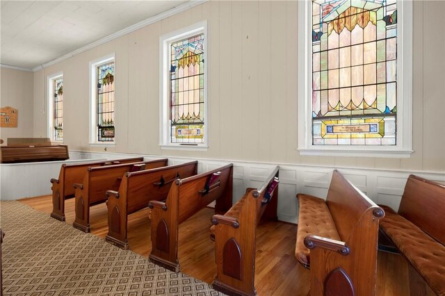 18 N Franklin St, Athens, NY 12015 - dining area with wood finished floors, ornamental molding, and a decorative wall