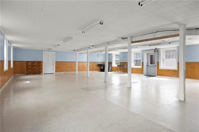 garage featuring wooden walls