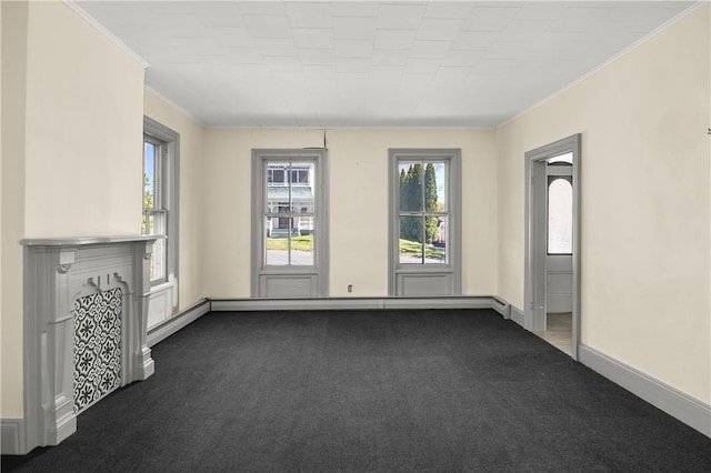 carpeted empty room featuring crown molding and a baseboard radiator