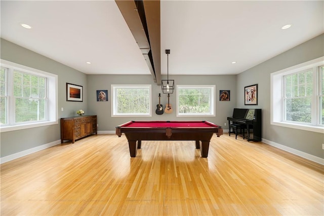 game room featuring light hardwood / wood-style floors and billiards