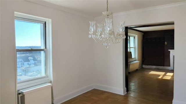 unfurnished dining area featuring radiator heating unit and a notable chandelier