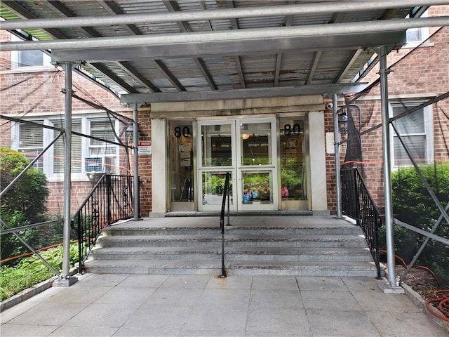 property entrance featuring french doors