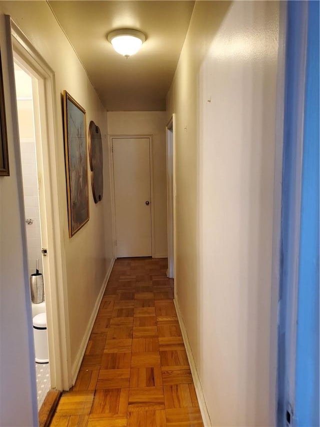 hall with parquet flooring