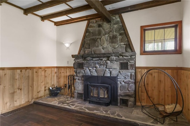 details with hardwood / wood-style floors and wooden walls