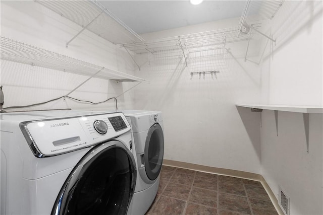 laundry area featuring separate washer and dryer