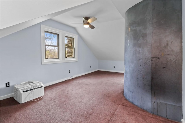 bonus room featuring lofted ceiling, ceiling fan, carpet floors, and a wall unit AC