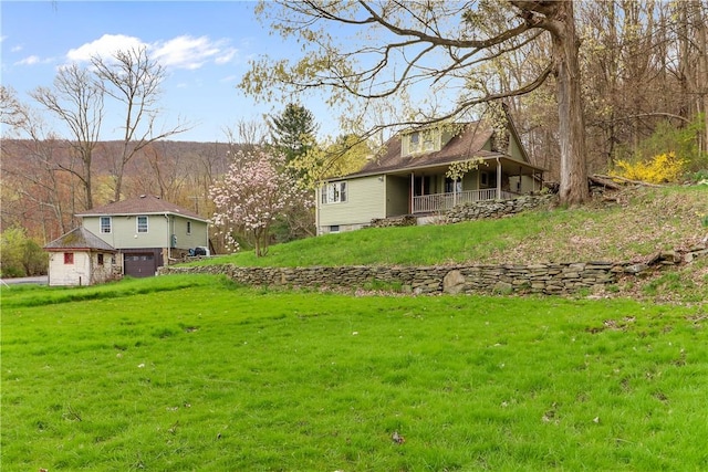 view of yard featuring a garage