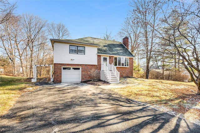 split level home with a garage