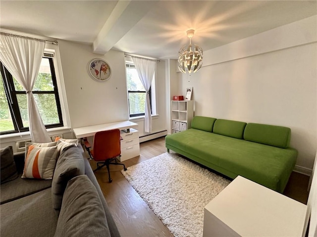 living room with hardwood / wood-style floors, a baseboard radiator, a healthy amount of sunlight, and beam ceiling