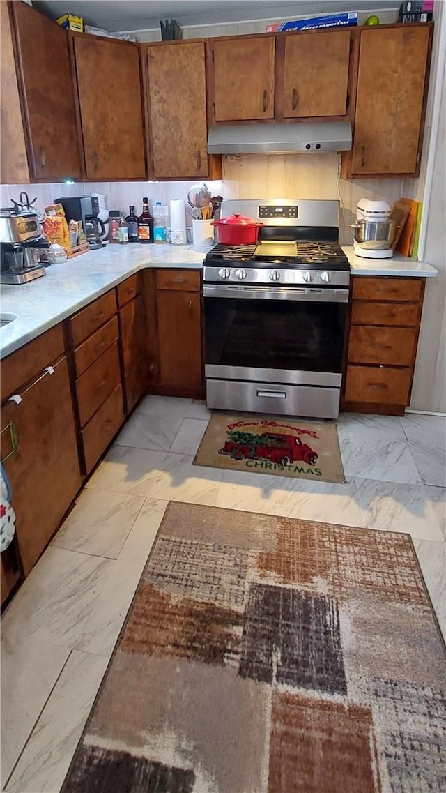 kitchen featuring gas range