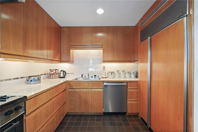 28 Heron Lake Rd, Bedford, NY 10506 - kitchen with dishwasher, sink, paneled fridge, tasteful backsplash, and dark tile patterned flooring