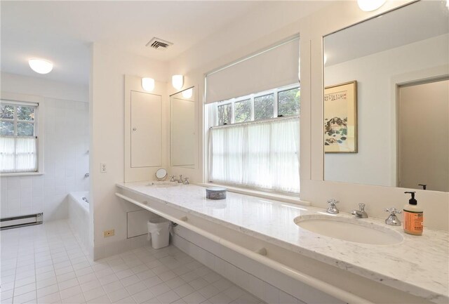 28 Heron Lake Rd, Bedford, NY 10506 - bathroom featuring tile patterned floors, vanity, plenty of natural light, and a bathtub