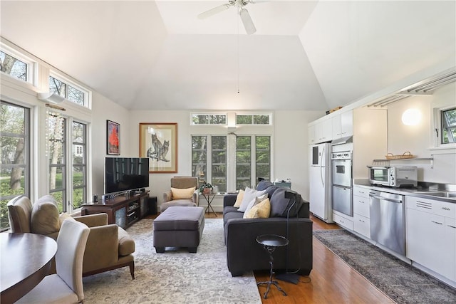 28 Heron Lake Rd, Bedford, NY 10506 - living room featuring hardwood / wood-style flooring, ceiling fan, and lofted ceiling