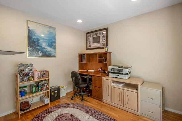 office with light wood finished floors, recessed lighting, and baseboards