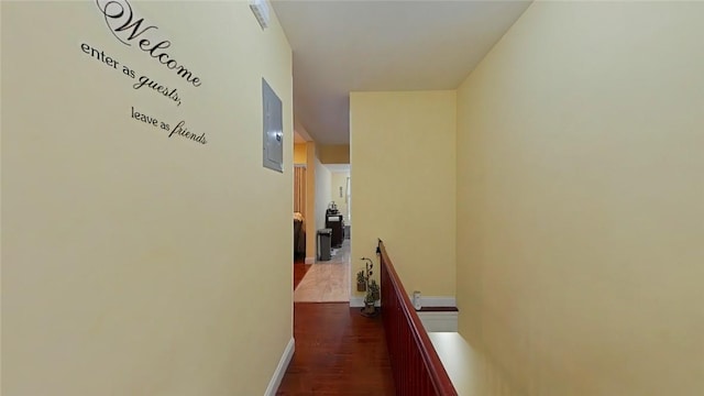 corridor featuring dark hardwood / wood-style floors